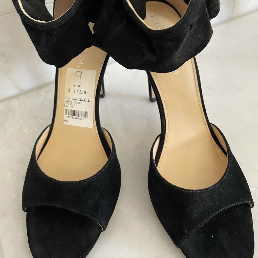 Ivanka Trump black suede open toe heels with frilly wrap on ankle area. Tag atch